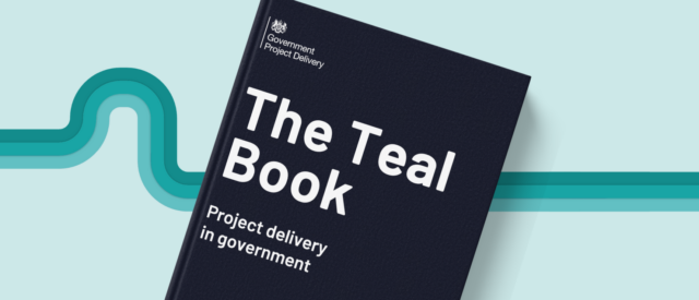 Dark blue book on a teal background. Book says 'The Teal Book'